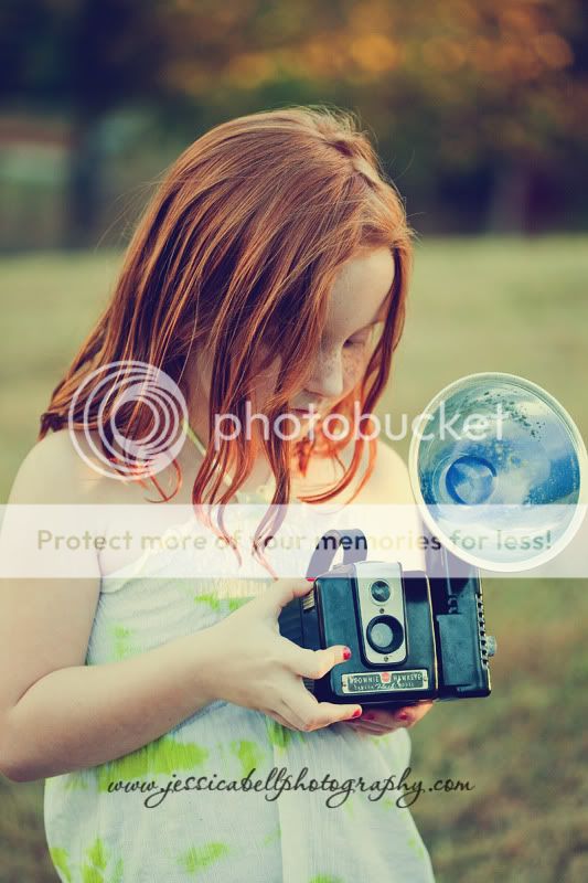 girl with vintage camera